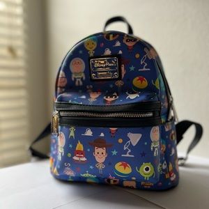 Rare Loungefly Disney World Of Pixar Woody Buzz Sulley mini backpack